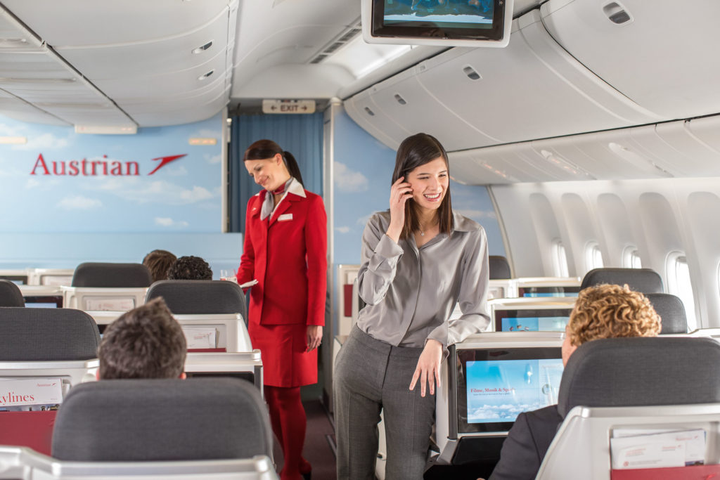 Austrian Airlines business class woman standing