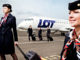 LOT pilots and cabin crew in front of aircraft
