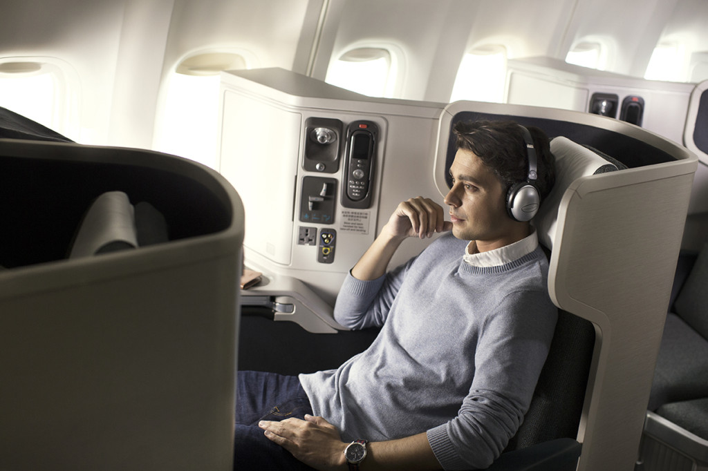 Cathay Pacific Business Class seat with male passenger