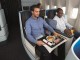 Meal service in KLM new longhaul World business class with two male passenger