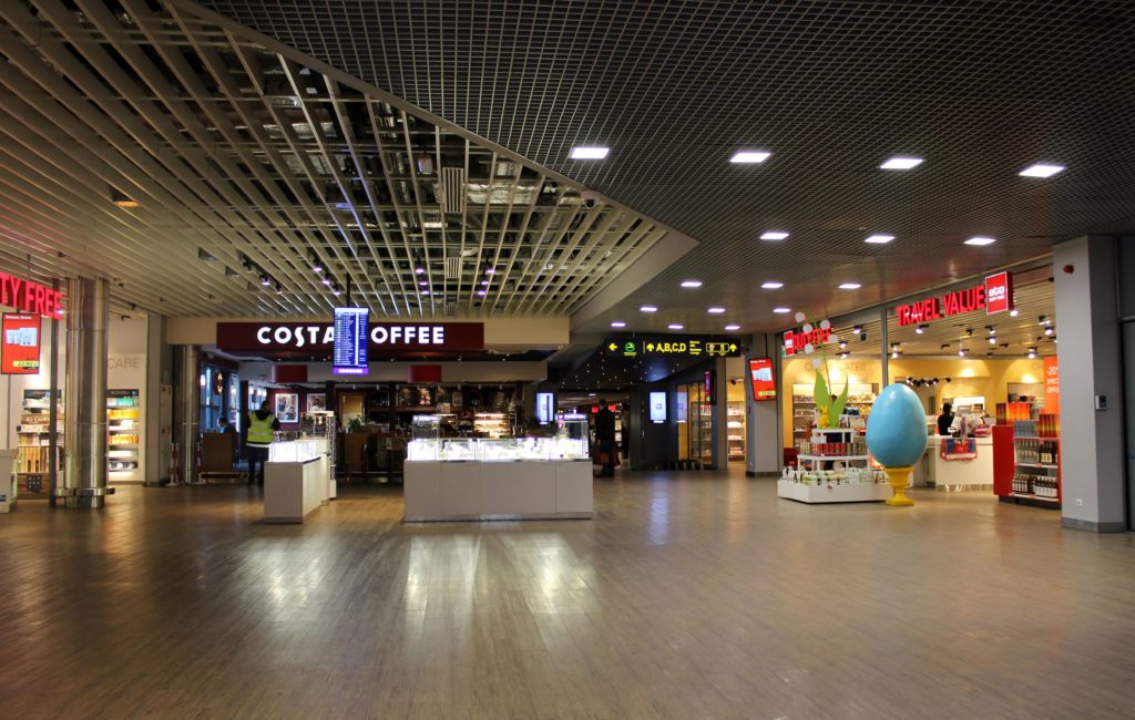 Belavia Economy Class Riga-Minsk transit hall with shops