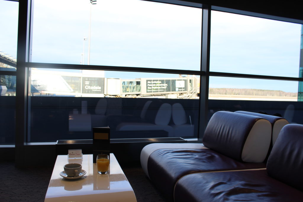 Belavia Economy Class Riga-Minsk lounge with coffee and orange juice