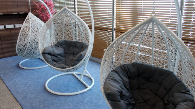 Bubble chairs in the LOT Polonez Lounge at Warsaw Chopin