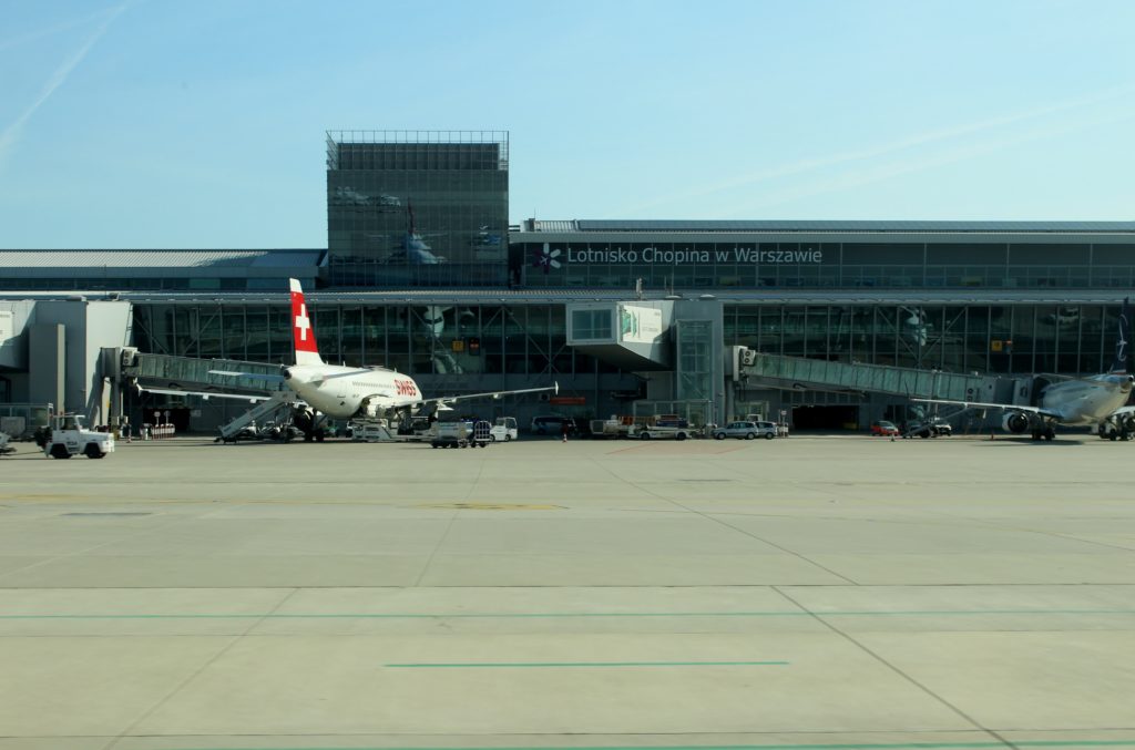 A Swiss aircraft at the terminal building at Warsaw Chopin airport