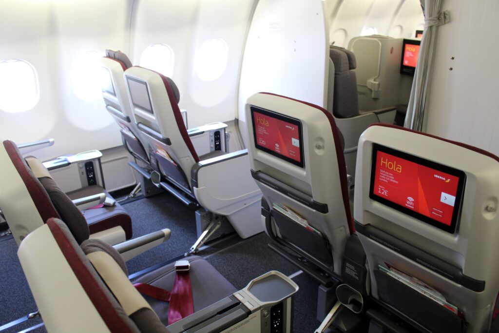 Iberia Premium Economy cabin and seats with screens on the Airbus A340