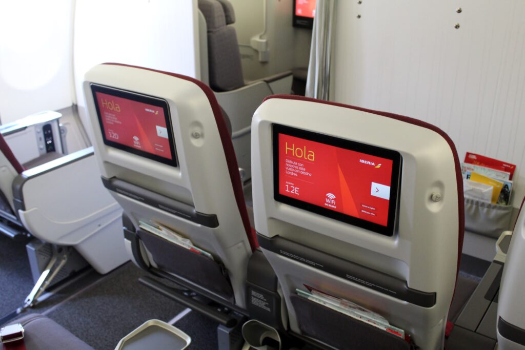 Iberia Premium Economy cabin and seats with screens on the Airbus A340