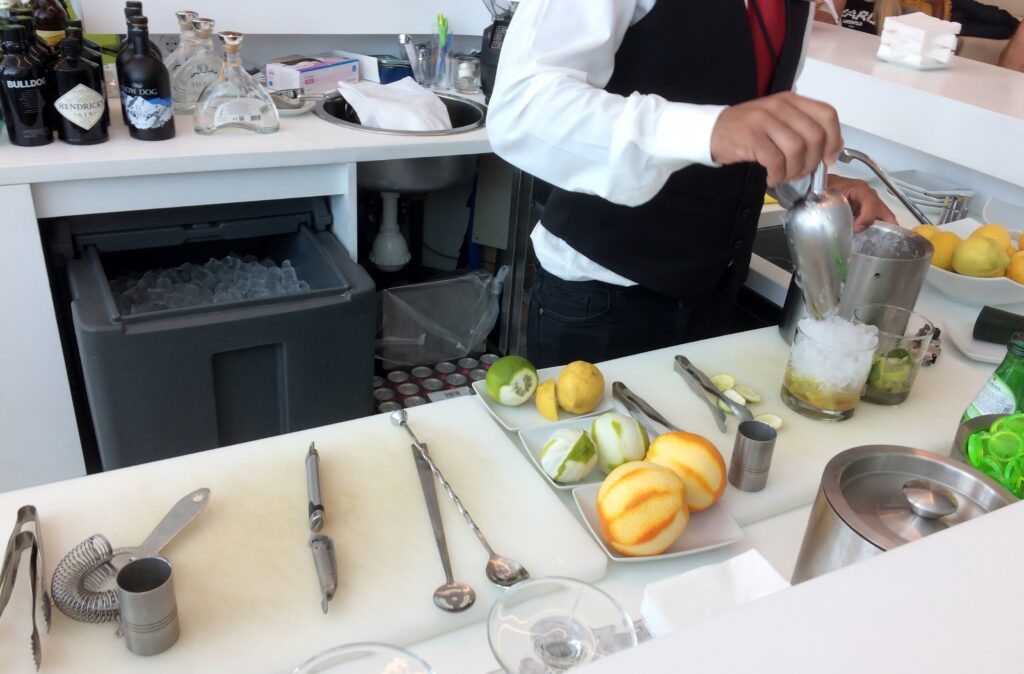 Gin & tonics at the bar in the TAP Lounge at Lisbon Airport