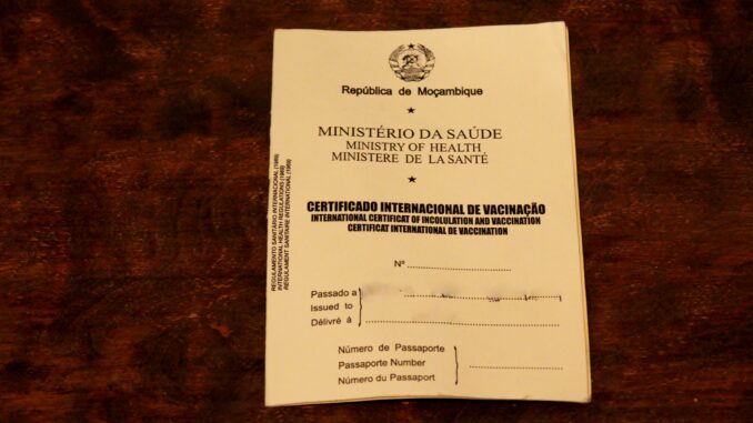 Yellow vaccination card from Mozambique